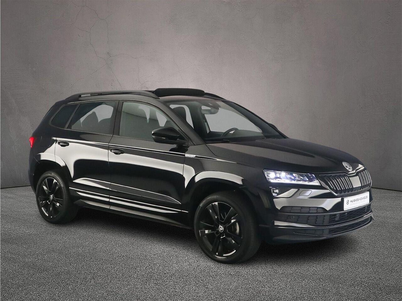 Skoda Karoq Sportline Business 1.5 TSI 150pk DSG Automaat Trekhaak, Panoramadak, Achteruitrijcamera, Adaptive cruise control, Navigatie, Elektrische achterklep