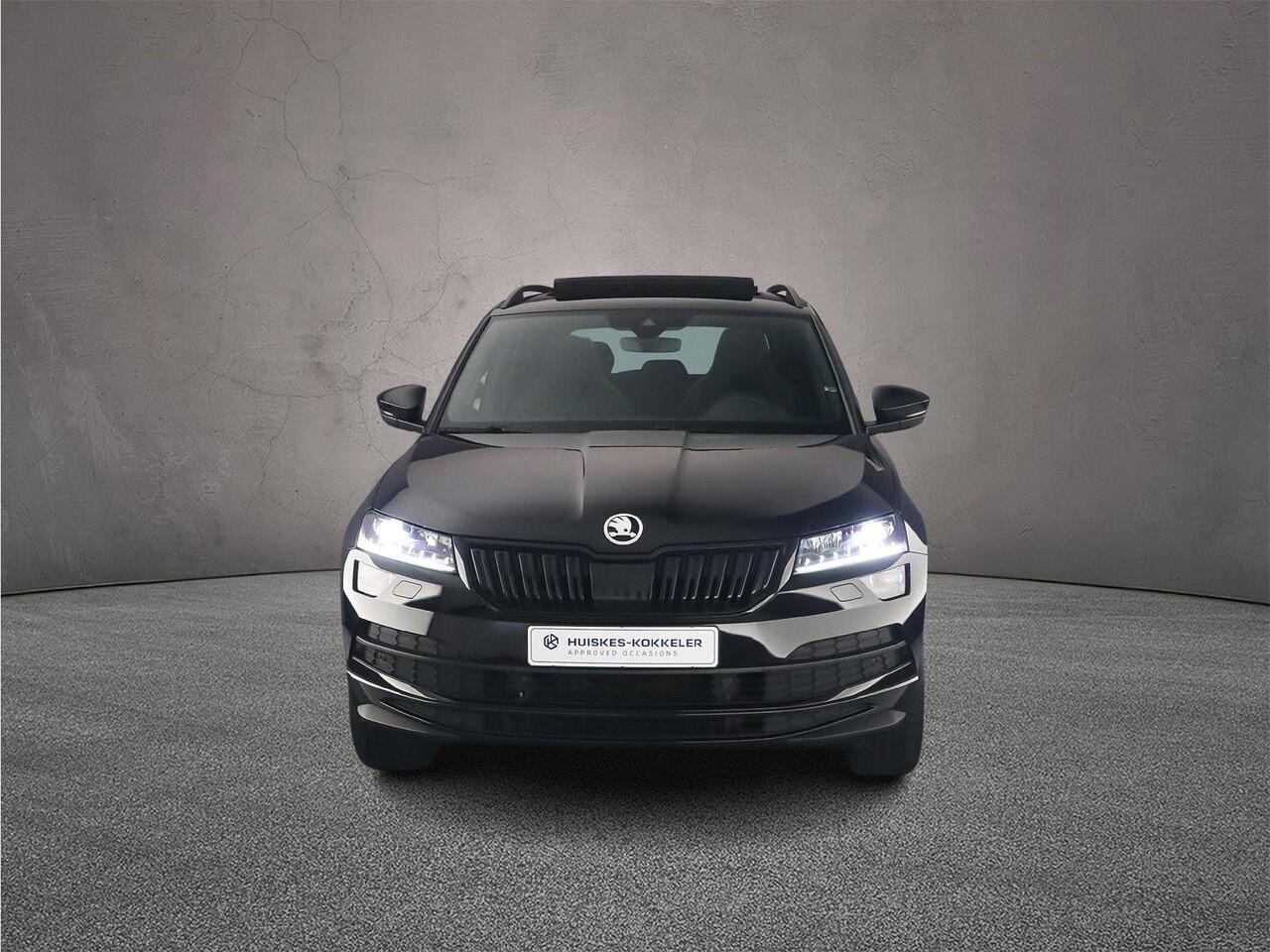 Skoda Karoq Sportline Business 1.5 TSI 150pk DSG Automaat Trekhaak, Panoramadak, Achteruitrijcamera, Adaptive cruise control, Navigatie, Elektrische achterklep