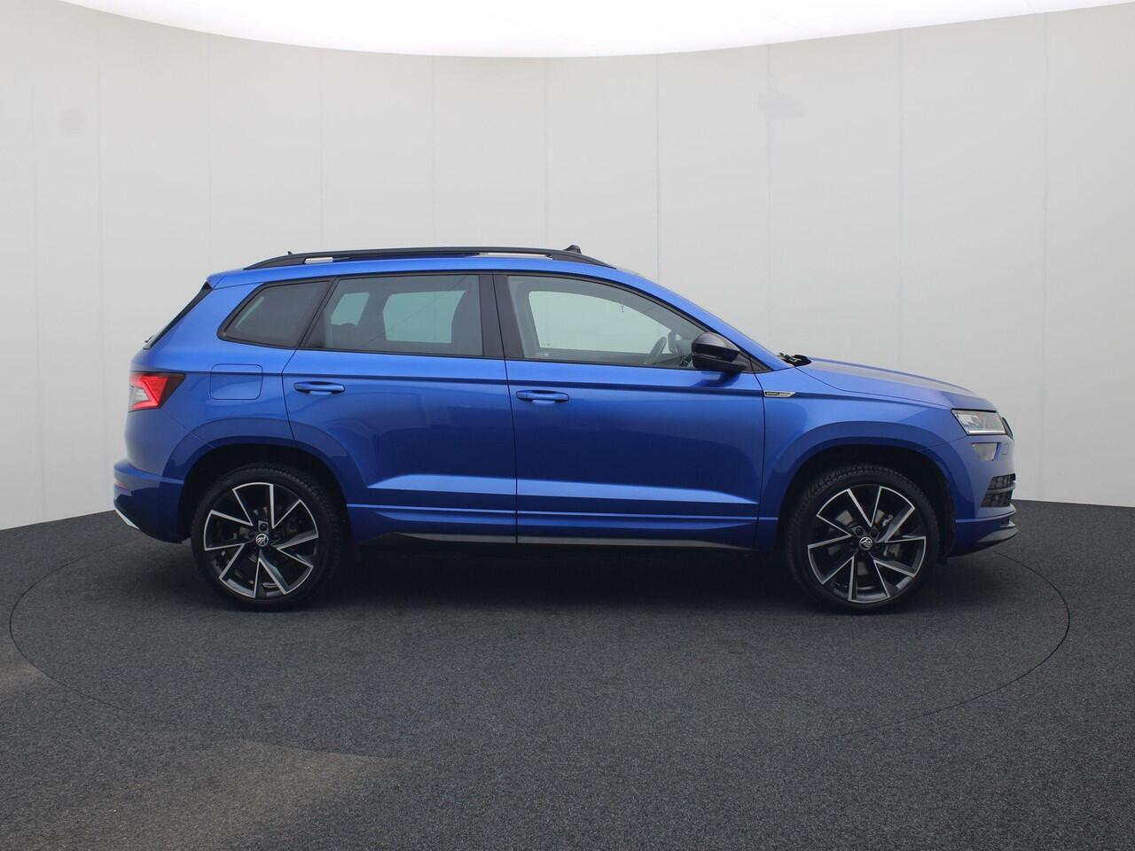 Skoda Karoq 1.5TSI/150pPK Sportline Business DSG · Panoramadak · Camera · Trekhaak · Apple/Android Car Play