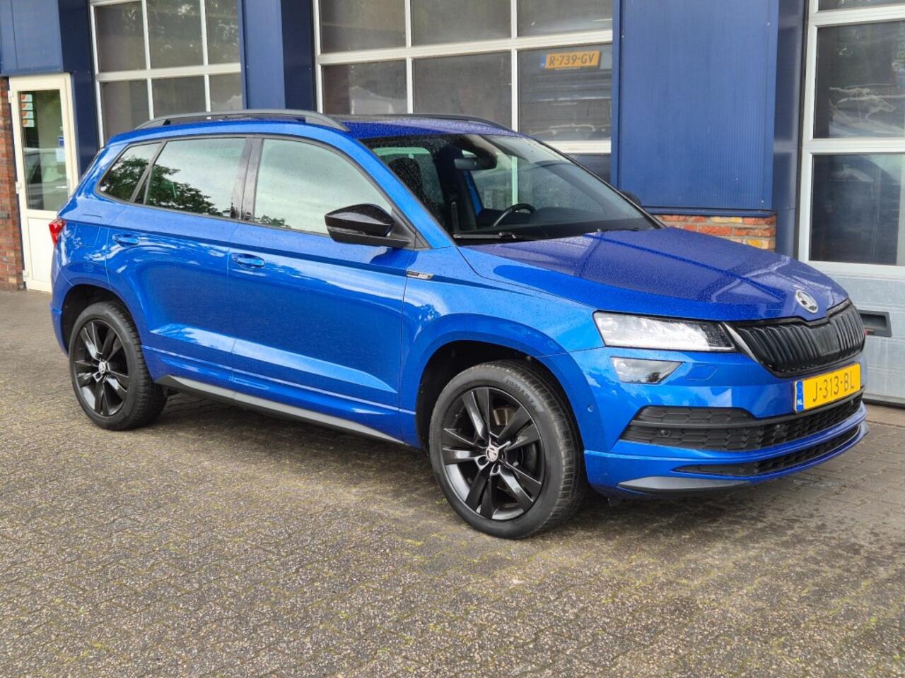 Skoda Karoq 1.5 TSI Sportline. Business. Aut, Trekhaak, Pano, Stoelverw, Camera ALL IN PRIJS.
