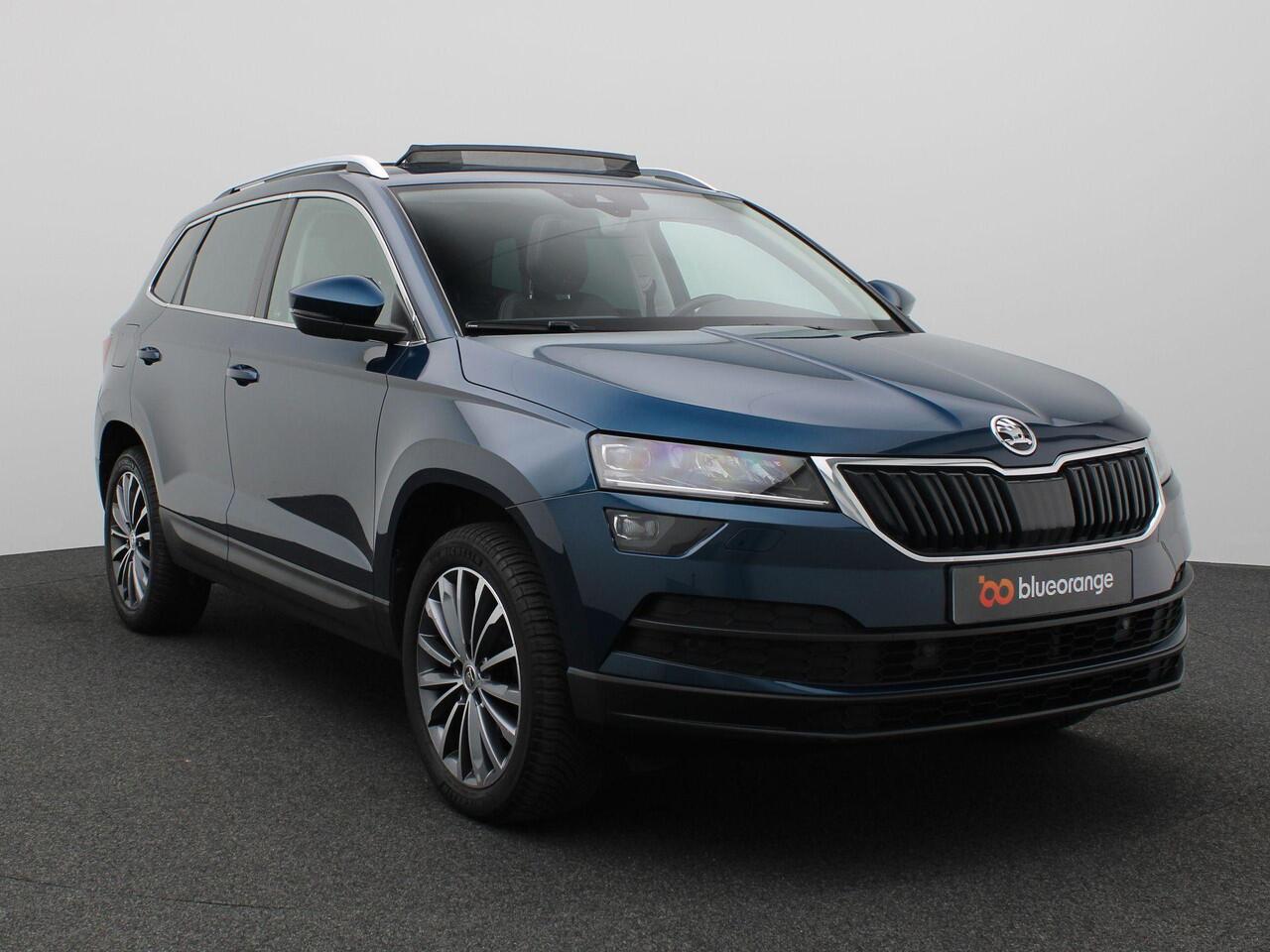 Skoda Karoq 1.5 TSI ACT Business Edition 150PK DSG Pano-Schuifdak, Canton Audio, Keyless, Memorystoel, Adaptieve Cruise Control, Achteruitrijcamera, Side Assist, Navi, Stoelverwarming, Voorruitverwarming, 18" LM Velgen