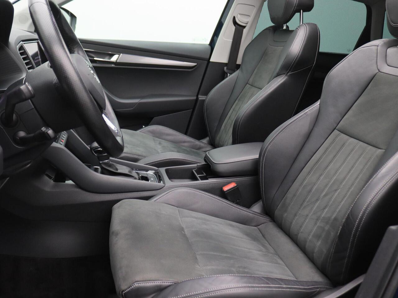 Skoda Karoq 1.5 TSI ACT Business Edition 150PK DSG Pano-Schuifdak, Canton Audio, Keyless, Memorystoel, Adaptieve Cruise Control, Achteruitrijcamera, Side Assist, Navi, Stoelverwarming, Voorruitverwarming, 18" LM Velgen