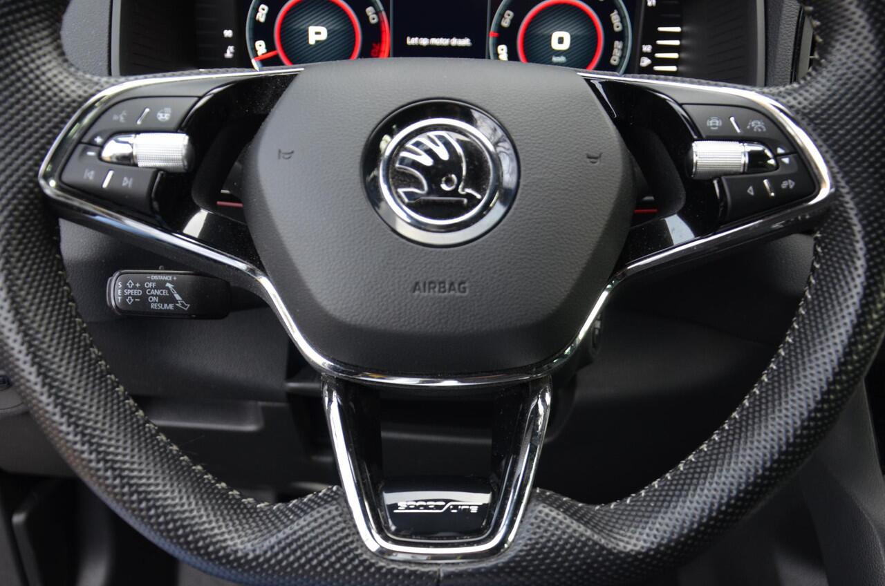 Skoda Karoq 1.5 TSI ACT Sportline Business Automaat/Navi/Audio installatie premium/Led/Pdc/Ecc/Stuur&Stoelverwarming/Virtual Cockpit/Achteruitrijcamera/Cr-Control adaptief/Canton/Privacy-Glass/19-Inch Lmv/Trekhaak wegklapbaar