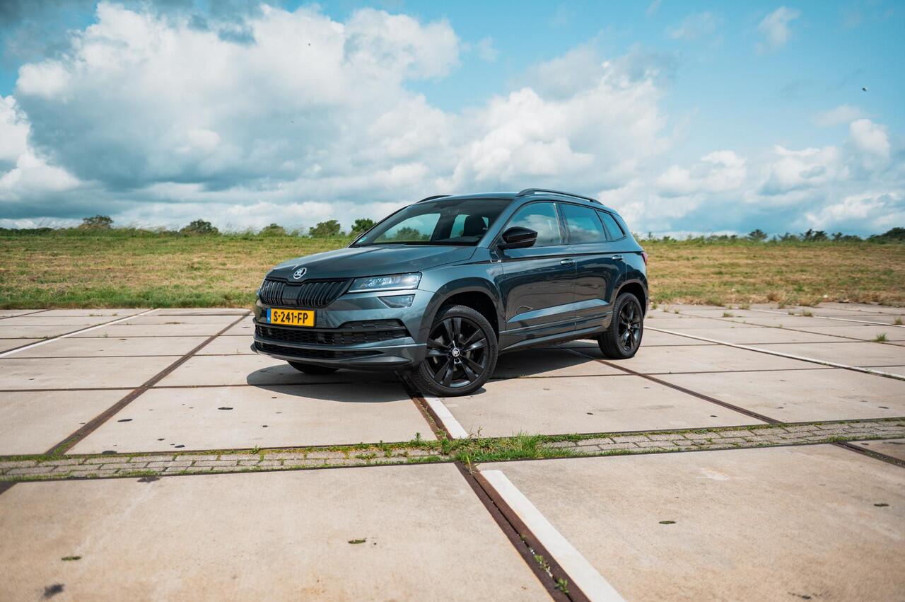 Skoda Karoq 1.5 TSI 150PK DSG Sportline | TREKHAAK | DIGI DASH | NAVI | ELEKTRISCH BEDIENBARE ACHTERKLEP | ADAPTIVE CRUISE CONTROL