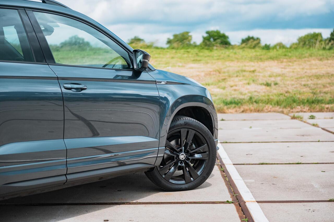 Skoda Karoq 1.5 TSI 150PK DSG Sportline | TREKHAAK | DIGI DASH | NAVI | ELEKTRISCH BEDIENBARE ACHTERKLEP | ADAPTIVE CRUISE CONTROL