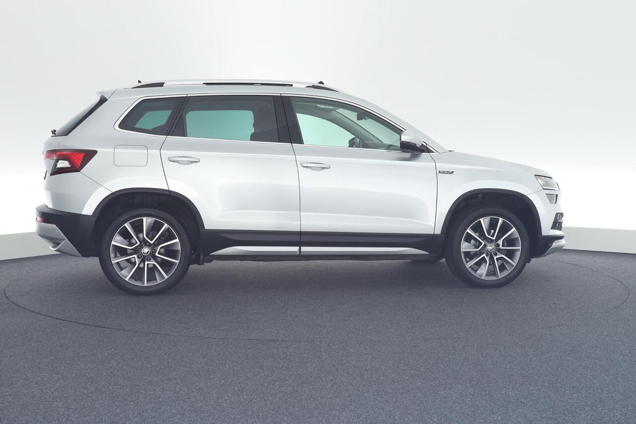 Skoda Karoq 1.5 TSI 150pk DSG ACT Scout Camera Keyless Stoelverwarming Virtual Cockpit Panoramadak Navigatie