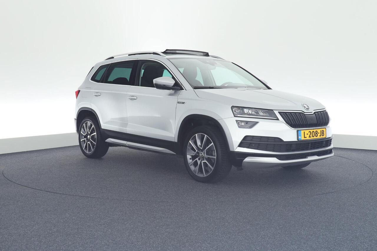 Skoda Karoq 1.5 TSI 150pk DSG ACT Scout Camera Keyless Stoelverwarming Virtual Cockpit Panoramadak Navigatie