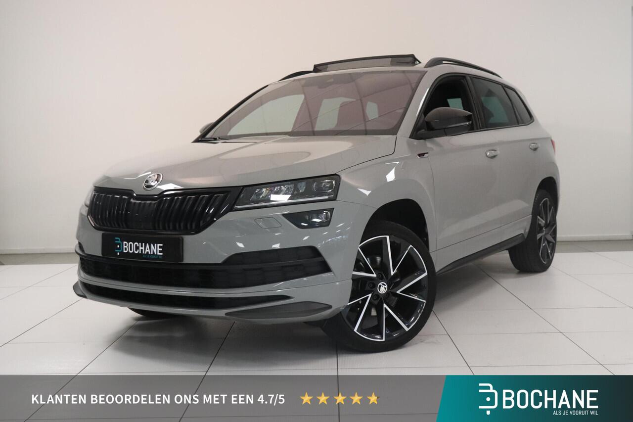 Skoda Karoq 1.5 TSI ACT Sportline Business | Adaptieve cruisecontrol | Camera | Panoramadak | Trekhaak | CANTON audio | Elektr achterklep | Stuur en stoel verwarming |