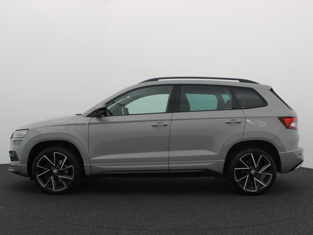 Skoda Karoq 1.5 TSI ACT Sportline Business AUTOMAAT / FULL LED / KEYLESS / STOELVERW / STUURVERW / CAMERA / NL-AUTO