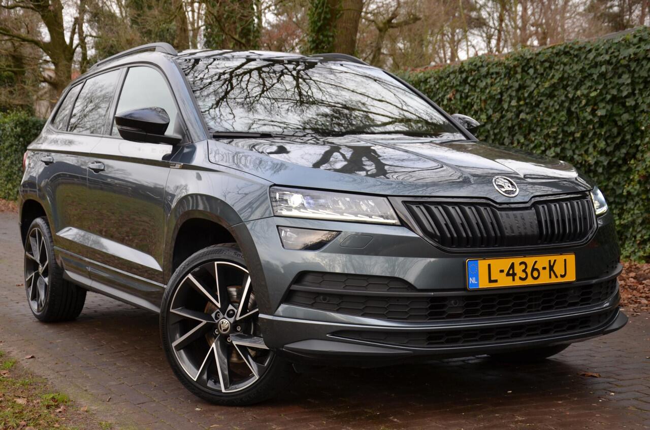 Skoda Karoq 1.5 TSI ACT Sportline Business Automaat/Navi/Led/Pdc/Ecc/Stoel & stuurverwarming/Virtual Cockpit/Achteruitrijcamera/Cr-Control adaptief/Privacy-Glass/wegklapbare Trekhaak