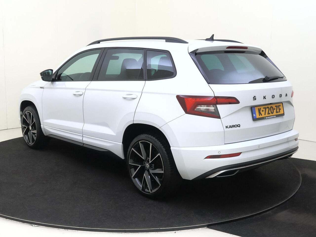 Skoda Karoq 1.5 TSI ACT Sportline Business | CANTON audio | Achteruitrijcamera | Cruise control | CarPlay | Keyless | Navigatie | Stoel- en stuurwielverwarming |