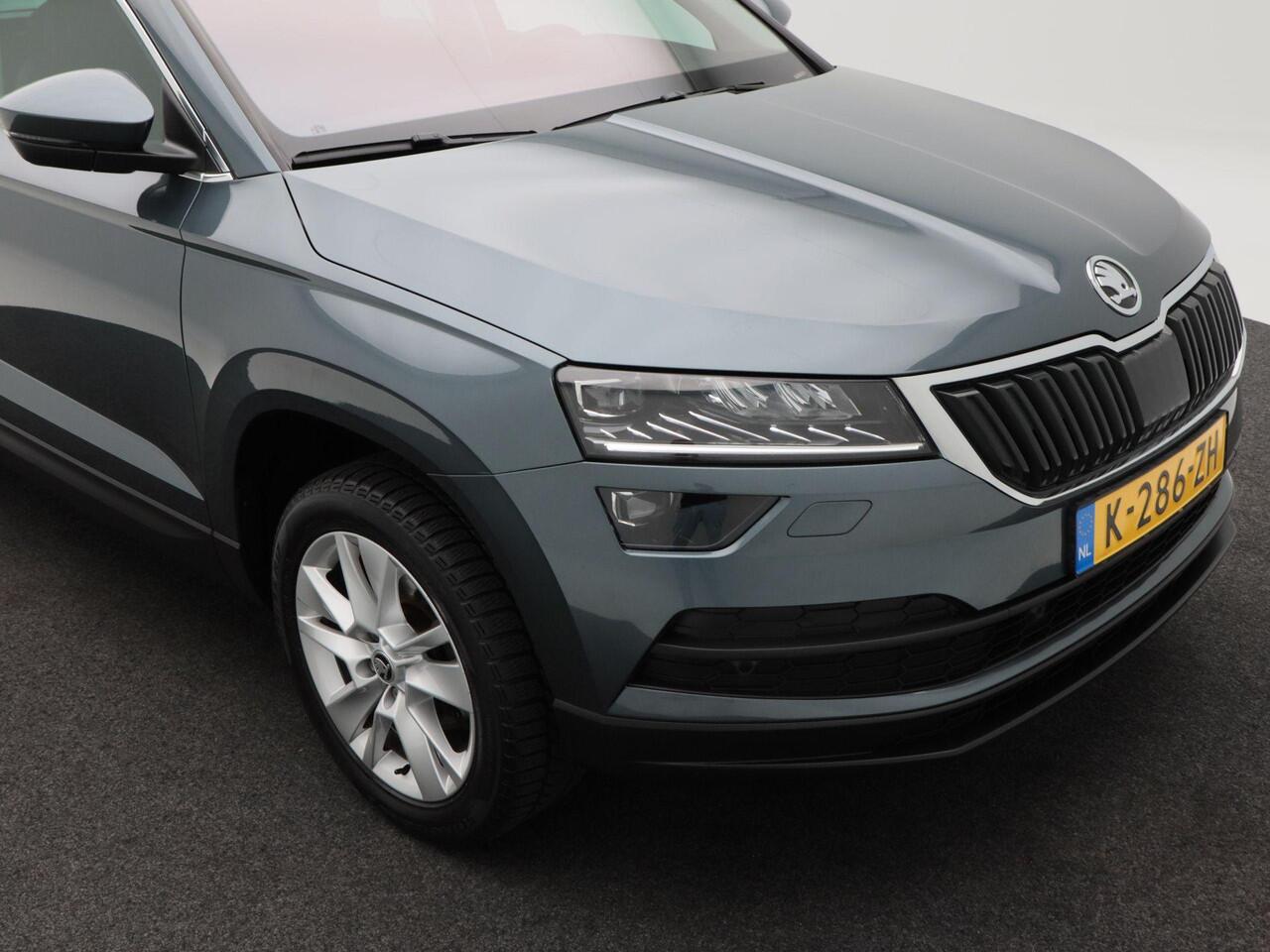 Skoda Karoq 1.5 TSi 150 Pk Automaat Business Edition Plus | Trekhaak | Camera | Stoelverwarming | Adaptive Cruise | CarPlay | 17 Inch