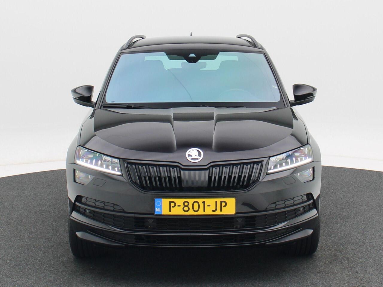 Skoda Karoq 1.5 TSi 150 Pk Automaat Sportline Business | Adaptive Cruise | Climate Control | Keyless | Stoelverwarming | Canton | Trekhaak | Navigatie | Camera | Carplay | LED | 123.026 Km!!