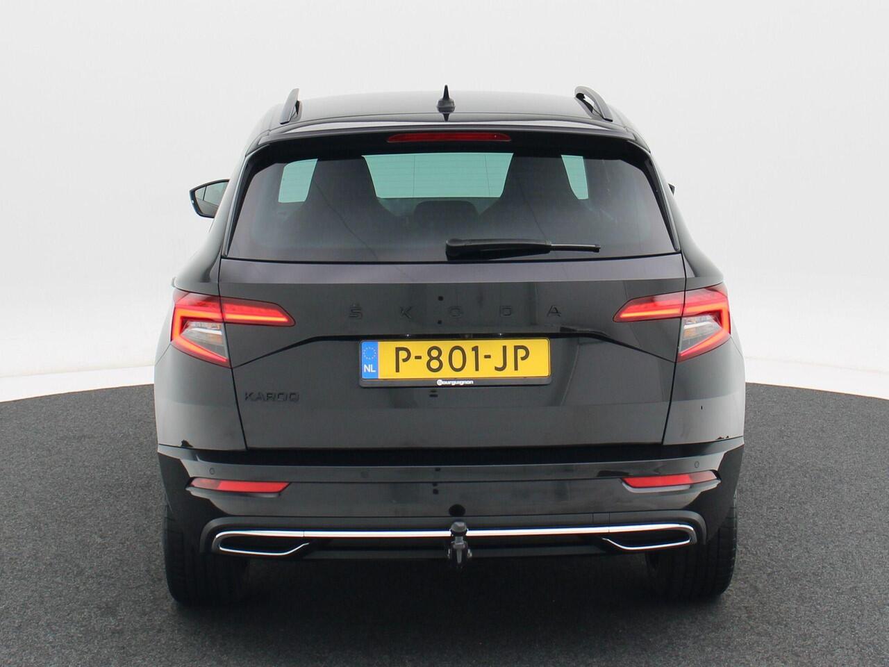 Skoda Karoq 1.5 TSi 150 Pk Automaat Sportline Business | Adaptive Cruise | Climate Control | Keyless | Stoelverwarming | Canton | Trekhaak | Navigatie | Camera | Carplay | LED | 123.026 Km!!