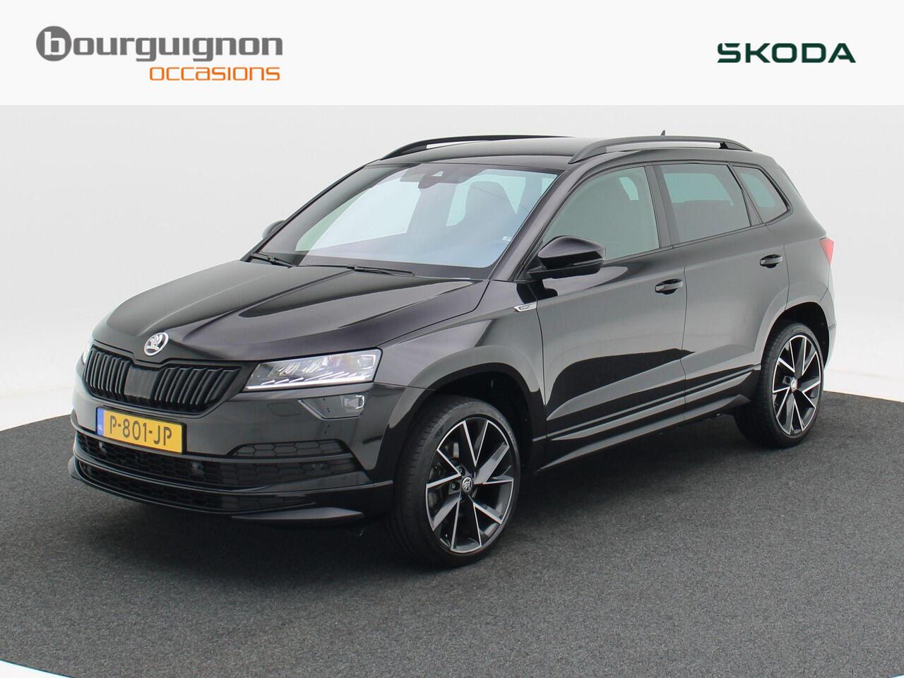 Skoda Karoq 1.5 TSi 150 Pk Automaat Sportline Business | Adaptive Cruise | Climate Control | Keyless | Stoelverwarming | Canton | Trekhaak | Navigatie | Camera | Carplay | LED | 123.026 Km!!