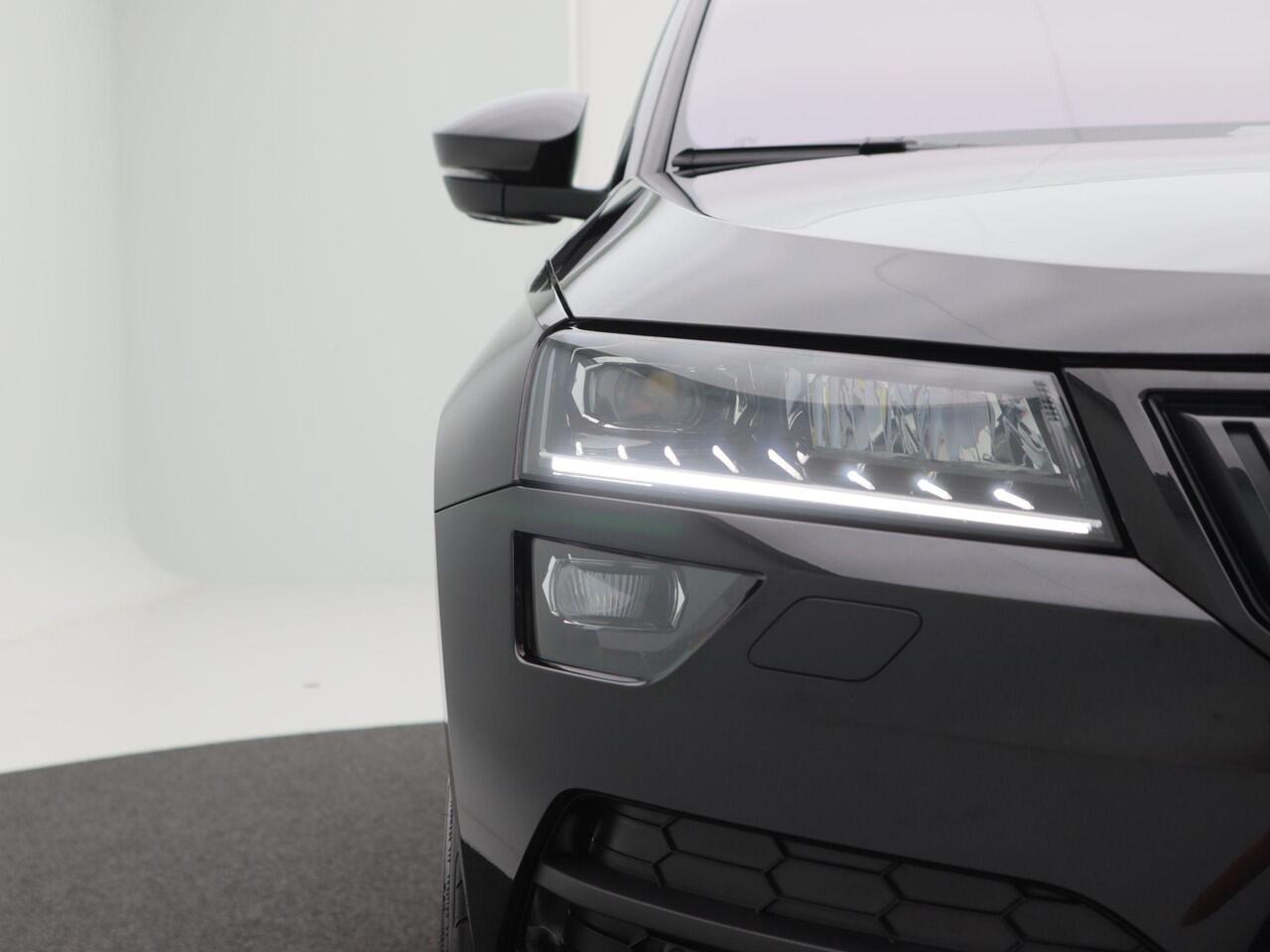 Skoda Karoq 1.5 TSi 150 Pk Automaat Sportline Business | Adaptive Cruise | Climate Control | Keyless | Stoelverwarming | Canton | Trekhaak | Navigatie | Camera | Carplay | LED | 123.026 Km!!