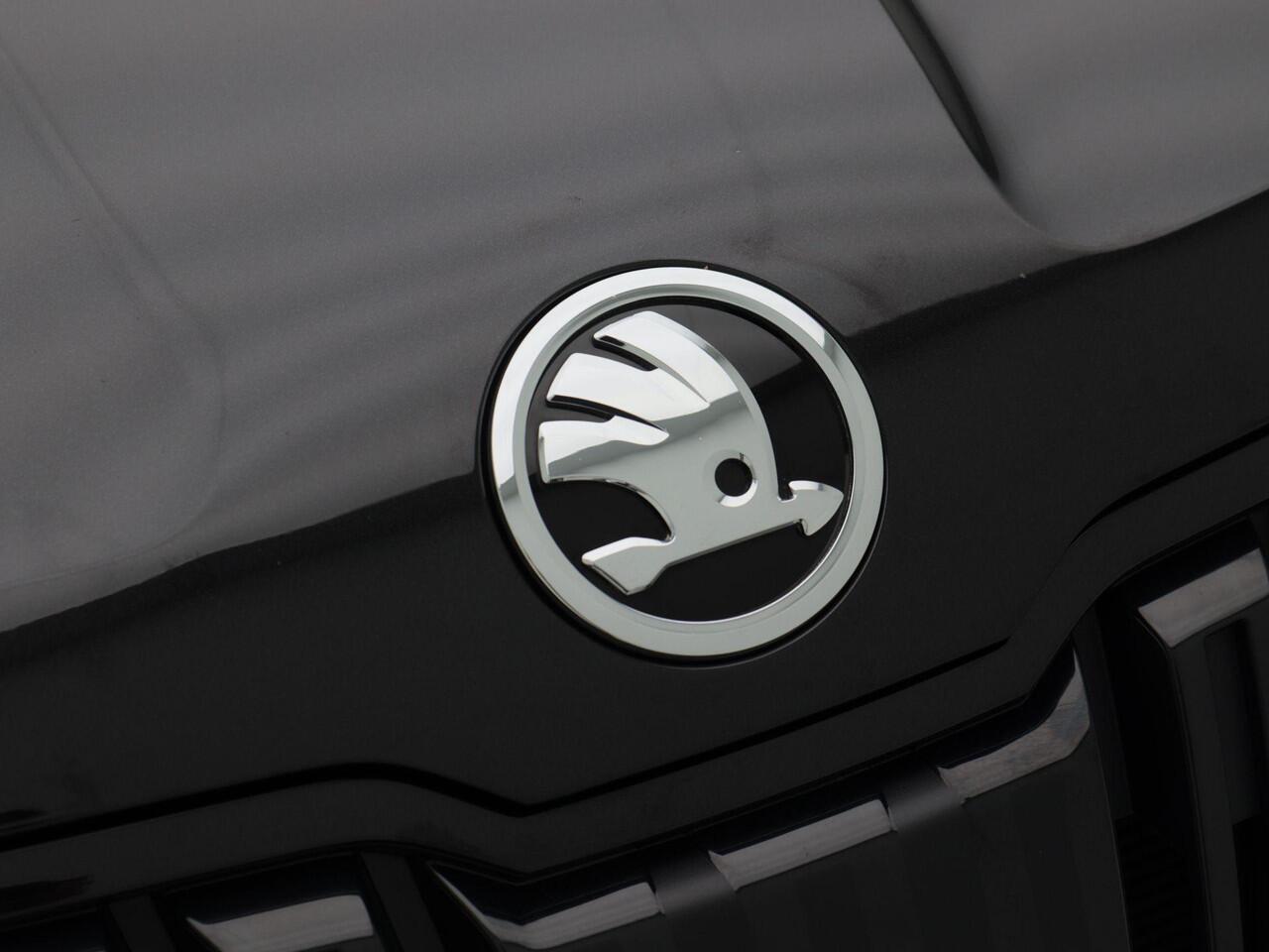 Skoda Karoq 1.5 TSi 150 Pk Automaat Sportline Business | Adaptive Cruise | Climate Control | Keyless | Stoelverwarming | Canton | Trekhaak | Navigatie | Camera | Carplay | LED | 123.026 Km!!