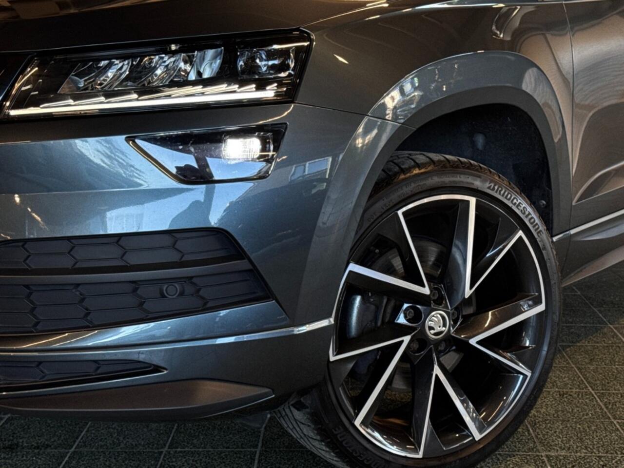 Skoda Karoq 1.5 TSI ACT Sportline Business DSG Virtual Trekhaak Navi Stoelverw 19''