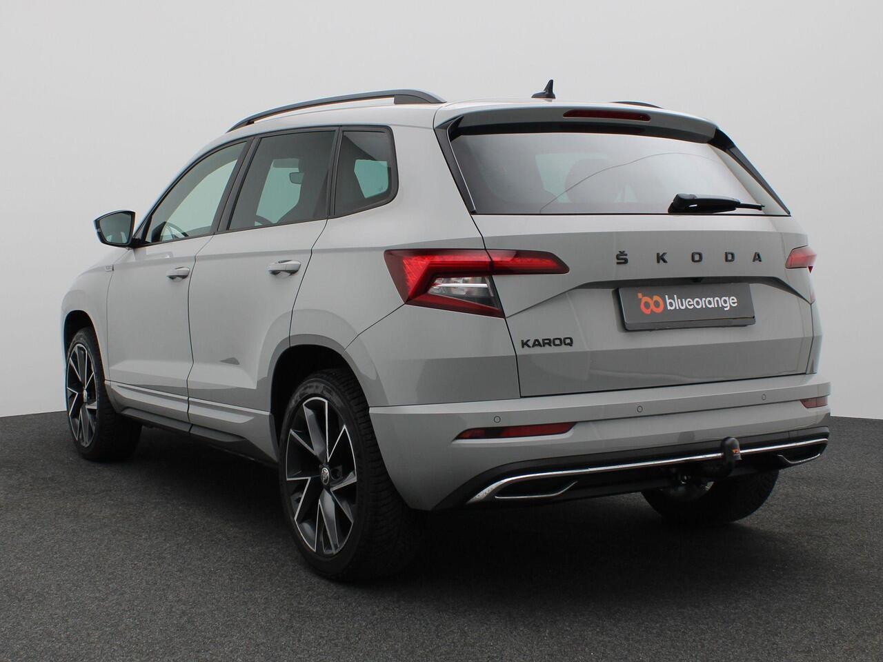 Skoda Karoq 1.5 TSI ACT Sportline Business 150PK DSG Trekhaak, Canton Audio, 19" LM Velgen, Elektr. Achterklep, Keyless, Adaptieve Cruise Controle, Achteruitrijcamera, Side Assist, Stoelverwarming, Voorruitverwarming