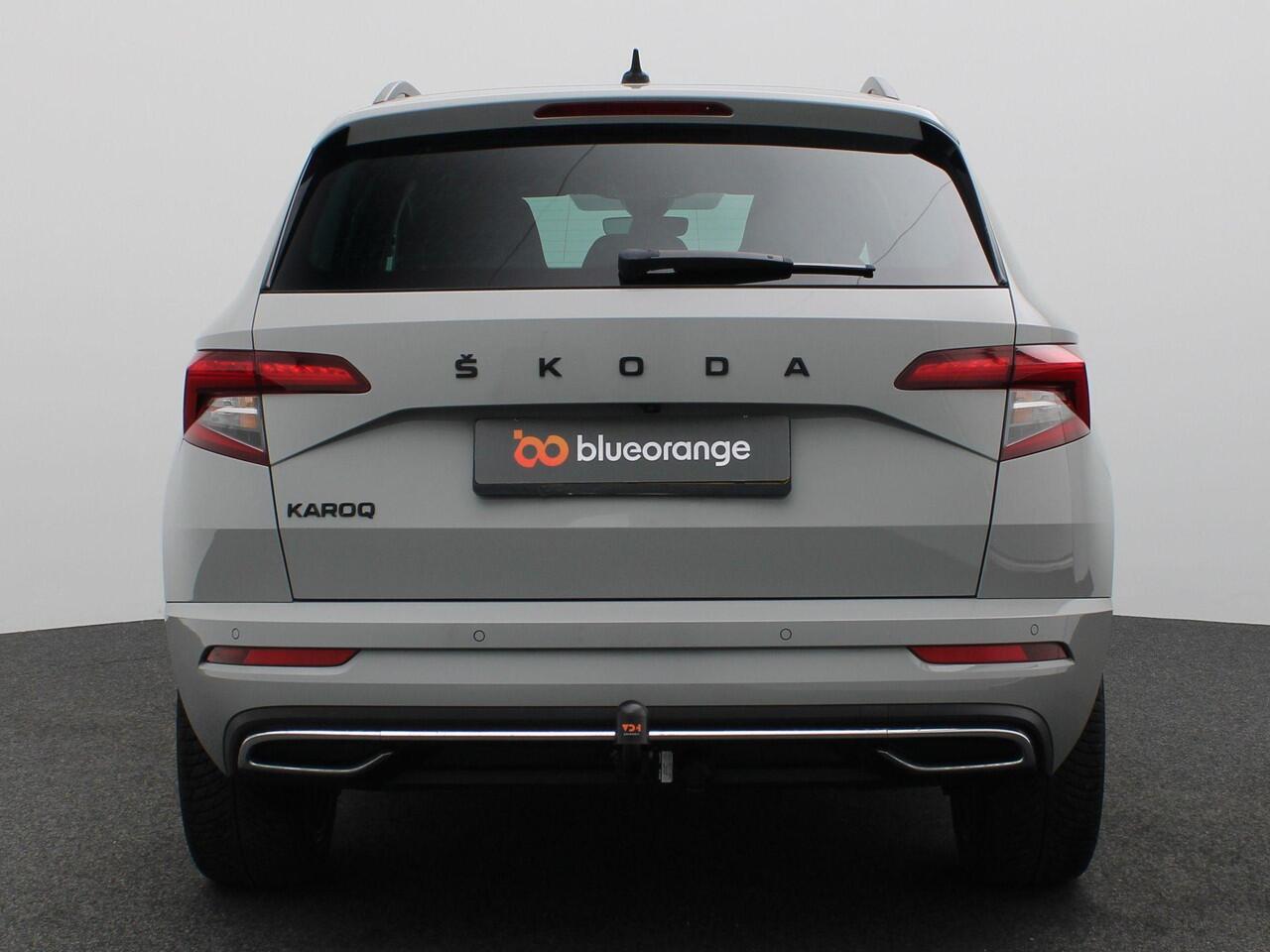 Skoda Karoq 1.5 TSI ACT Sportline Business 150PK DSG Trekhaak, Canton Audio, 19" LM Velgen, Elektr. Achterklep, Keyless, Adaptieve Cruise Controle, Achteruitrijcamera, Side Assist, Stoelverwarming, Voorruitverwarming