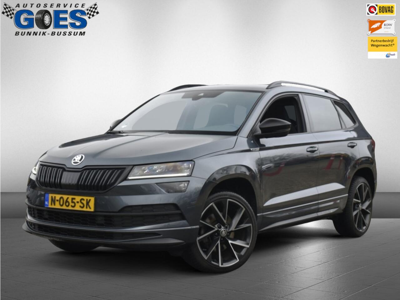 Skoda Karoq (financiering mogelijk) 1.5 TSI Sportline Busines /trekhaak/camera/stuurverwarming