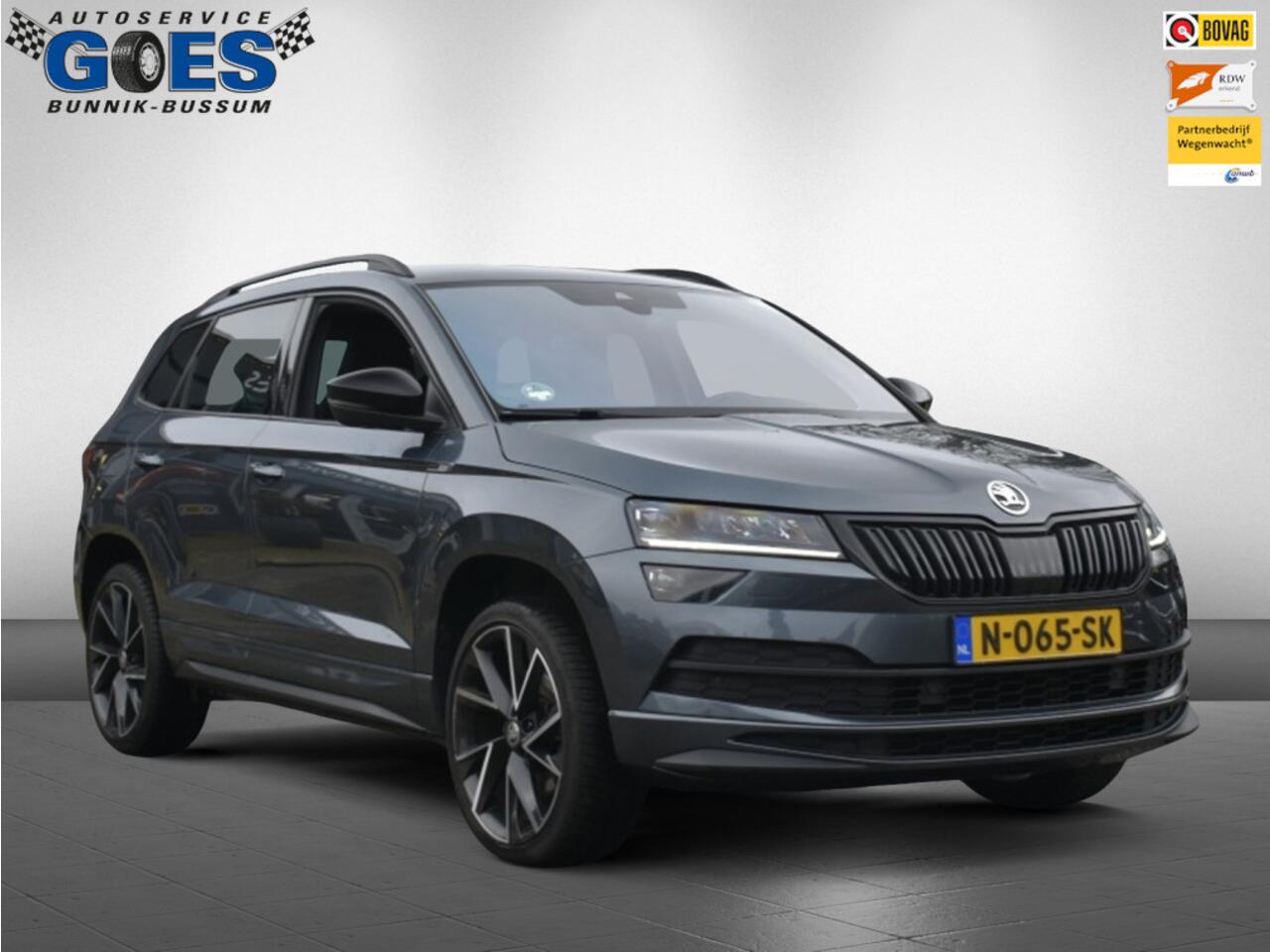 Skoda Karoq (financiering mogelijk) 1.5 TSI Sportline Busines /trekhaak/camera/stuurverwarming