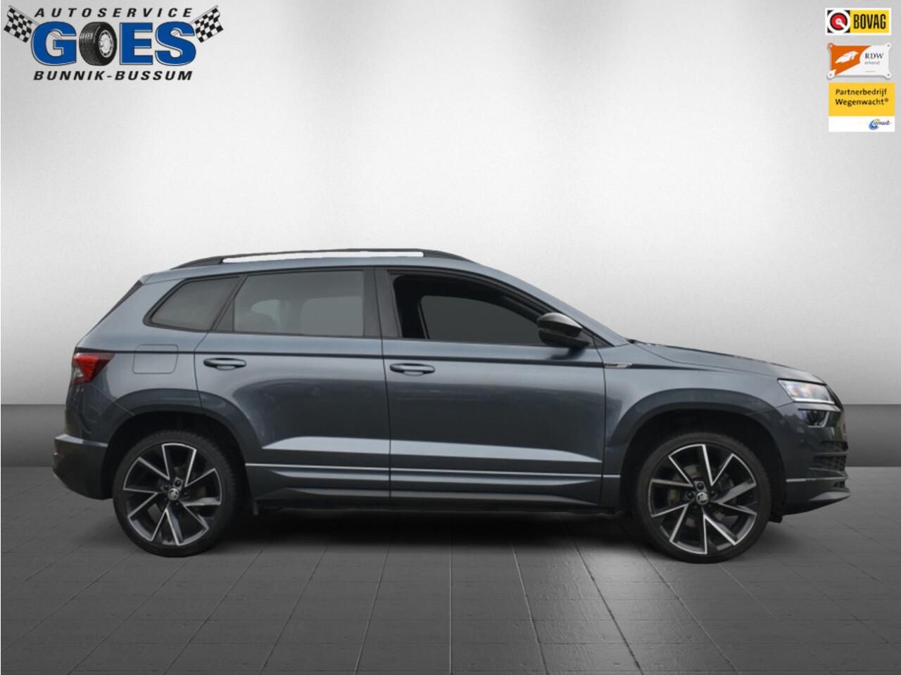 Skoda Karoq (financiering mogelijk) 1.5 TSI Sportline Busines /trekhaak/camera/stuurverwarming