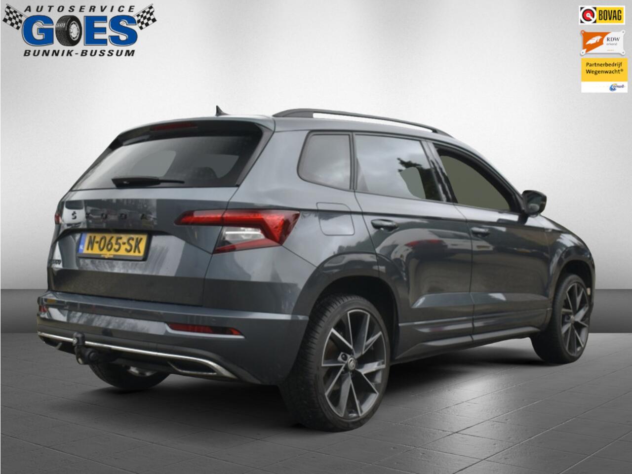 Skoda Karoq (financiering mogelijk) 1.5 TSI Sportline Busines /trekhaak/camera/stuurverwarming