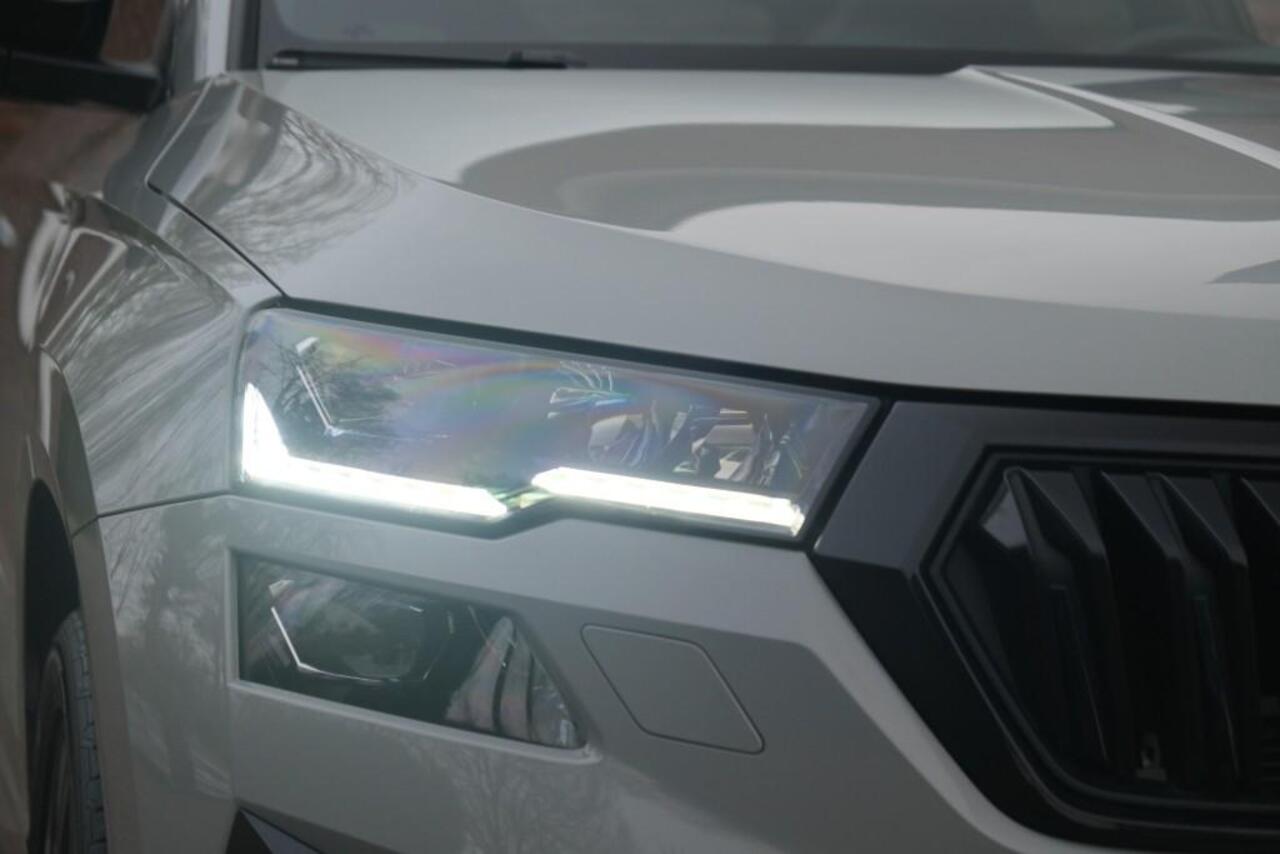 Skoda Karoq 1.5 TSi 150pk DSG Sportline Business | Navi | App Connect | Climate | Adaptive Cruise | Panoramadak | Keyless | Camera | Trekhaak