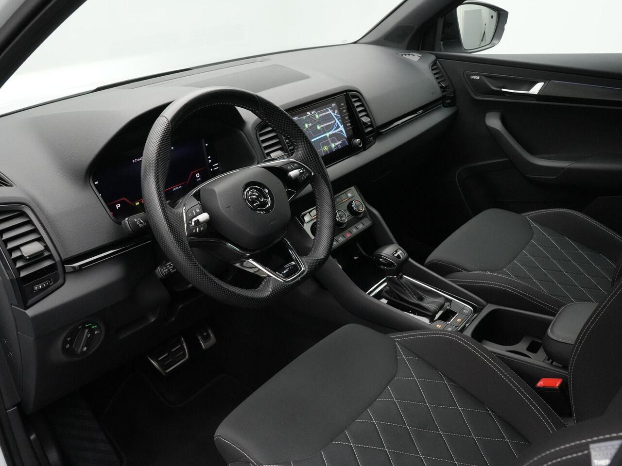 Skoda Karoq 1.5 TSI 150 pk DSG Sportline Business | LED Matrix | Trekhaak | Rondomzicht camera | CANTON sound | Stoel-/achterbankverwarming | Side Assist