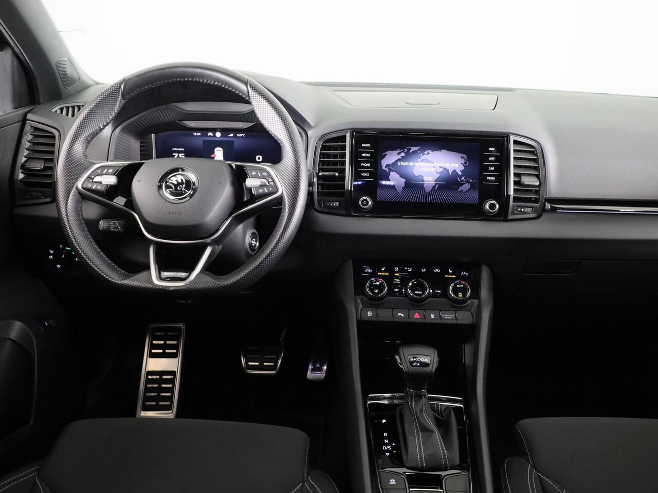 Skoda Karoq 1.5 TSI ACT Sportline Business 150 pk Automaat (DSG) | Verlengde garantie | Navigatie via App | Parkeersensoren | Achteruitrijcamera | Adaptieve cruise control | Stoelverwarming |