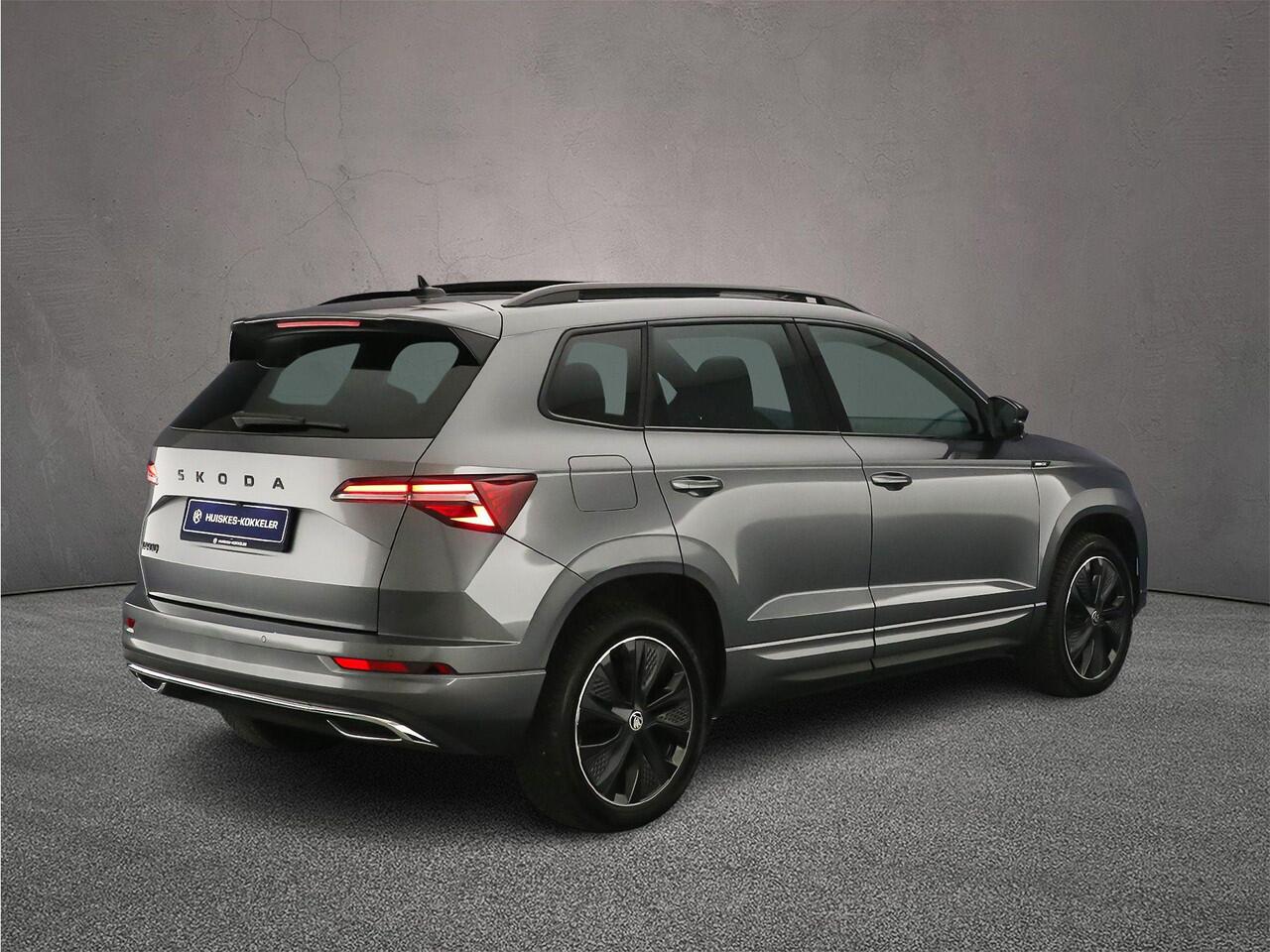 Skoda Karoq Sportline Business 1.5 TSI 150pk DSG Automaat Trekhaak, Panoramadak, Elektrische achterklep, Adaptive cruise control, Navigatie, Achteruitrijcamera,