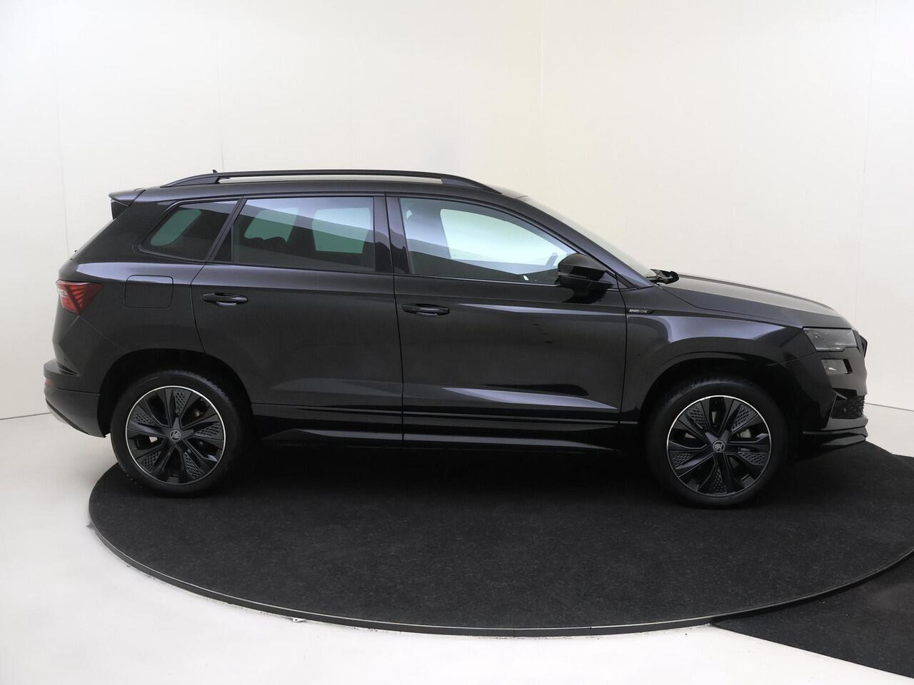 Skoda Karoq 1.5 TSI ACT Sportline Business | Trekhaak | Achteruitrijcamera | Keyless | Adaptieve cruise control | CarPlay | Digital cockpit | Navigatie |