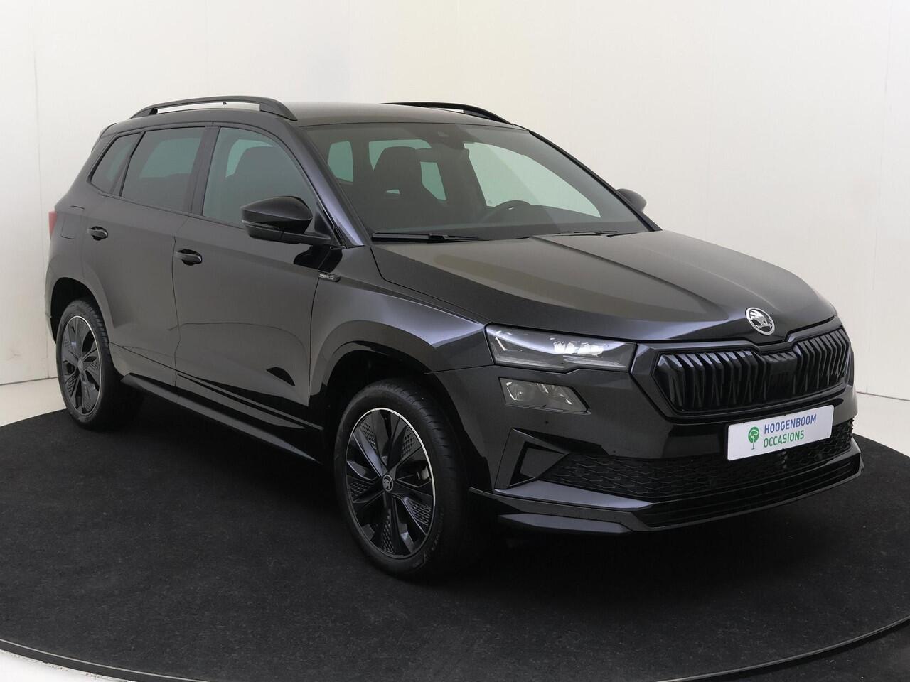 Skoda Karoq 1.5 TSI ACT Sportline Business | Trekhaak | Achteruitrijcamera | Keyless | Adaptieve cruise control | CarPlay | Digital cockpit | Navigatie |