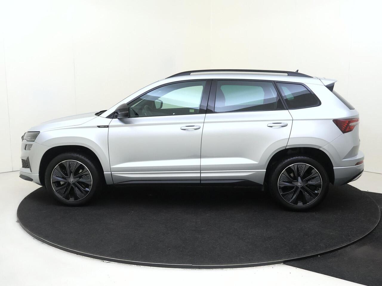 Skoda Karoq 1.5 TSI ACT Sportline Business | Trekhaak | Achteruitrijcamera | Keyless | Adaptieve cruise control | CarPlay | Digital cockpit | Navigatie |