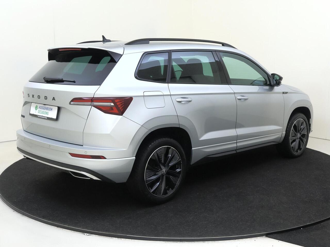 Skoda Karoq 1.5 TSI ACT Sportline Business | Trekhaak | Achteruitrijcamera | Keyless | Adaptieve cruise control | CarPlay | Digital cockpit | Navigatie |