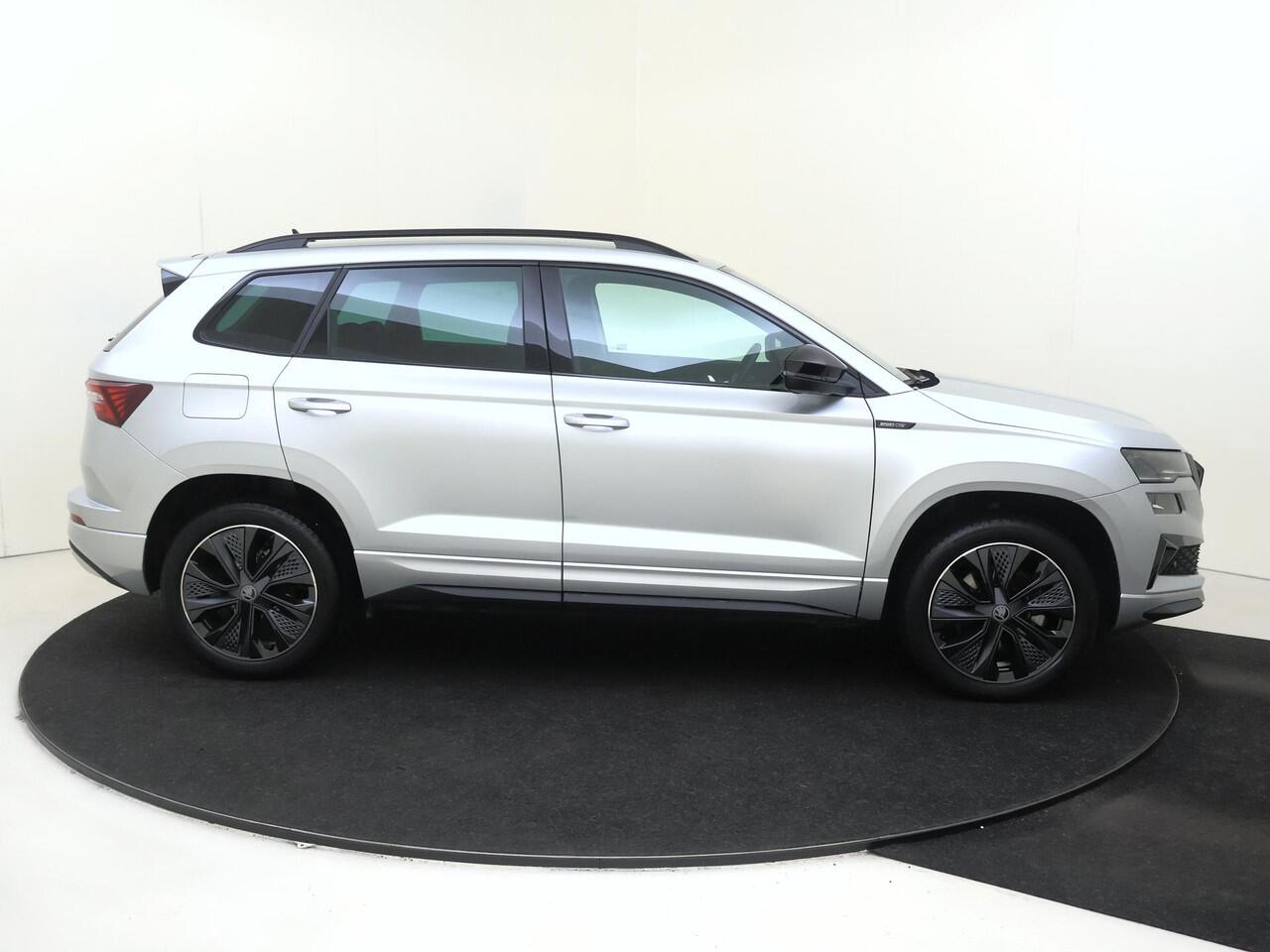 Skoda Karoq 1.5 TSI ACT Sportline Business | Trekhaak | Achteruitrijcamera | Keyless | Adaptieve cruise control | CarPlay | Digital cockpit | Navigatie |