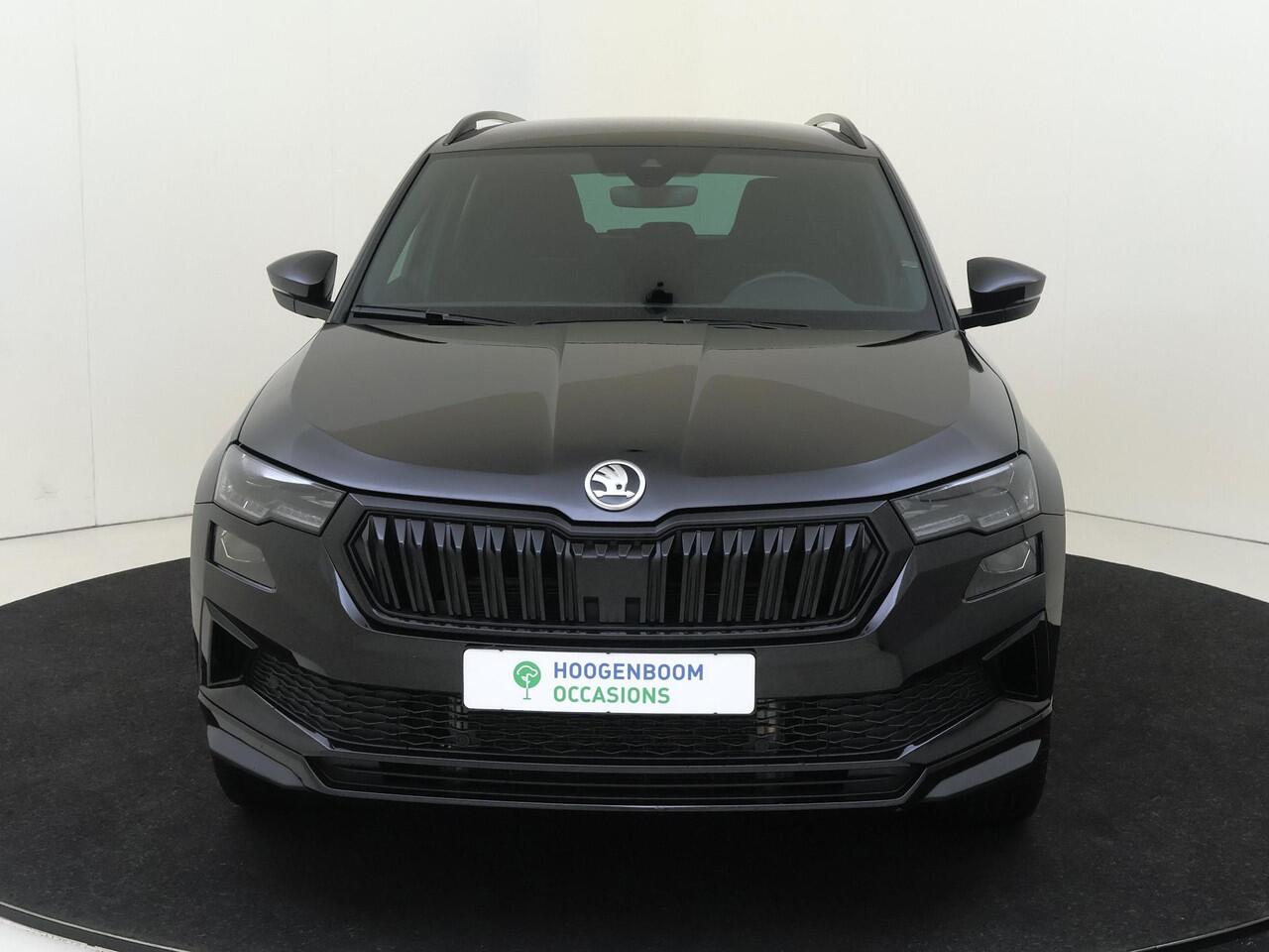 Skoda Karoq 1.5 TSI ACT Sportline Business | Trekhaak | Achteruitrijcamera | Keyless | Adaptieve cruise control | CarPlay | Digital cockpit | Navigatie |