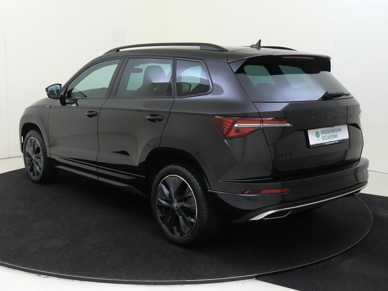 Skoda Karoq 1.5 TSI ACT Sportline Business | Trekhaak | Achteruitrijcamera | Keyless | Adaptieve cruise control | CarPlay | Digital cockpit | Navigatie |