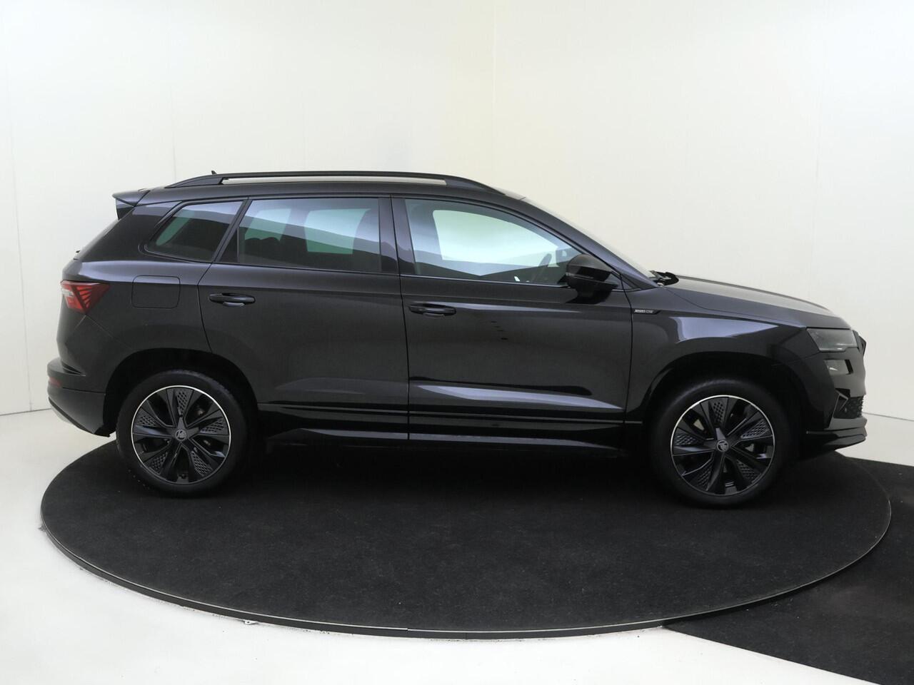 Skoda Karoq 1.5 TSI ACT Sportline Business | Trekhaak | Achteruitrijcamera | Keyless | Adaptieve cruise control | CarPlay | Digital cockpit | Navigatie |