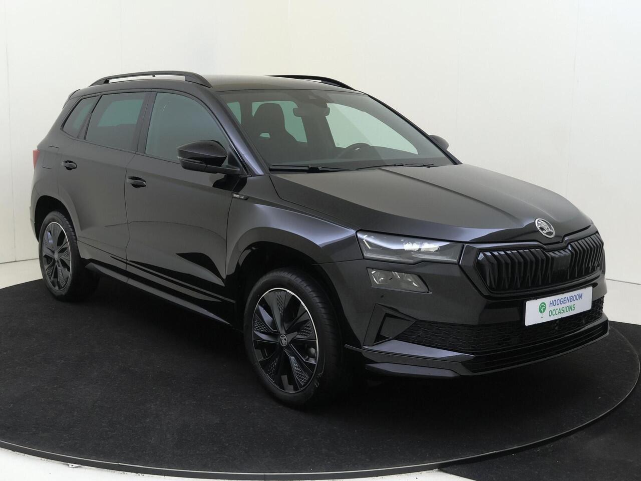 Skoda Karoq 1.5 TSI ACT Sportline Business | Trekhaak | Achteruitrijcamera | Keyless | Adaptieve cruise control | CarPlay | Digital cockpit | Navigatie |