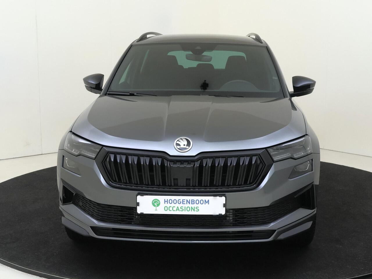 Skoda Karoq 1.5 TSI ACT Sportline Business | Trekhaak | Achteruitrijcamera | Keyless | Adaptieve cruise control | CarPlay | Digital cockpit | Navigatie |