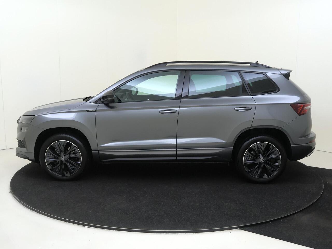 Skoda Karoq 1.5 TSI ACT Sportline Business | Trekhaak | Achteruitrijcamera | Keyless | Adaptieve cruise control | CarPlay | Digital cockpit | Navigatie |