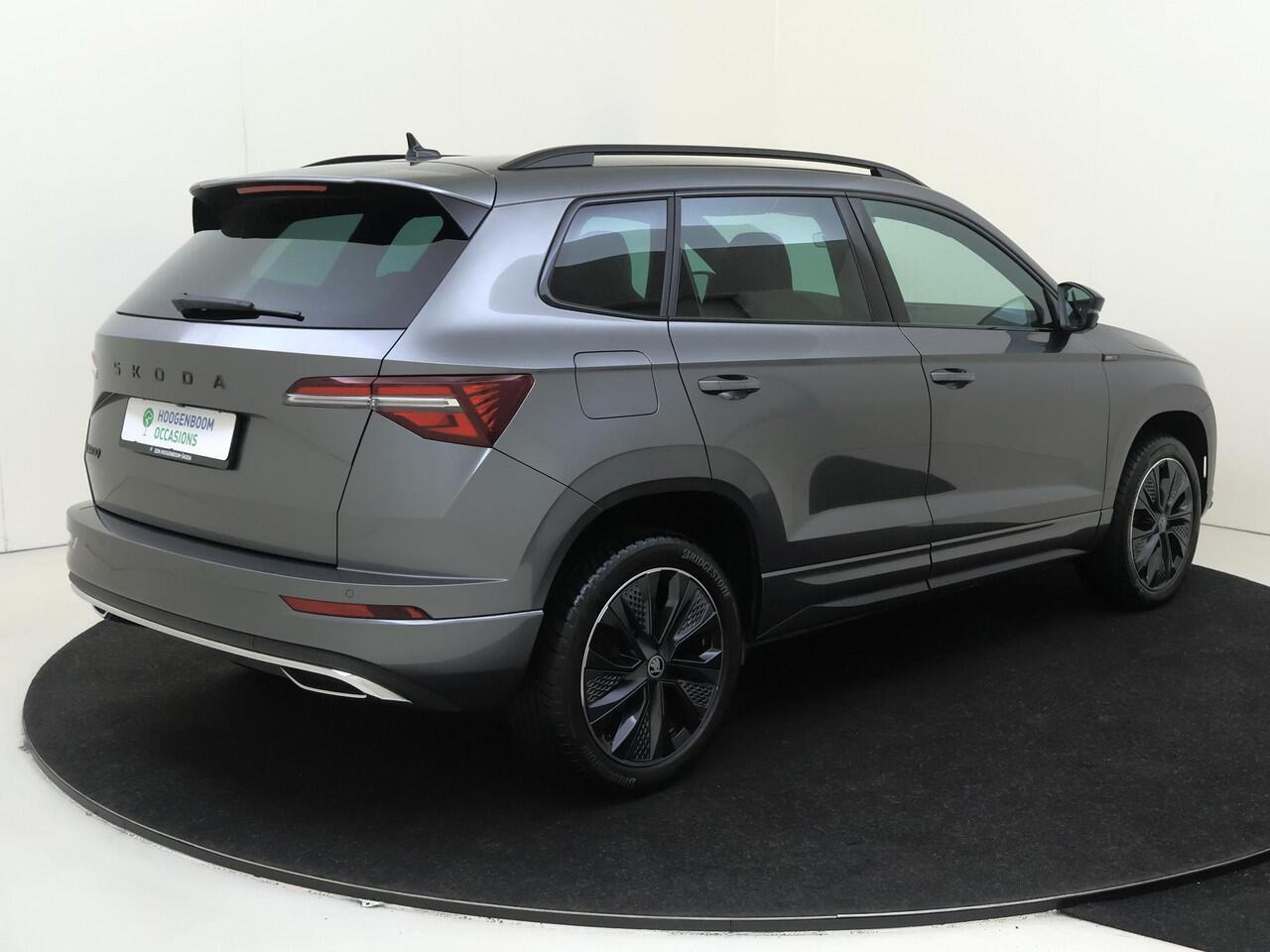 Skoda Karoq 1.5 TSI ACT Sportline Business | Trekhaak | Achteruitrijcamera | Keyless | Adaptieve cruise control | CarPlay | Digital cockpit | Navigatie |
