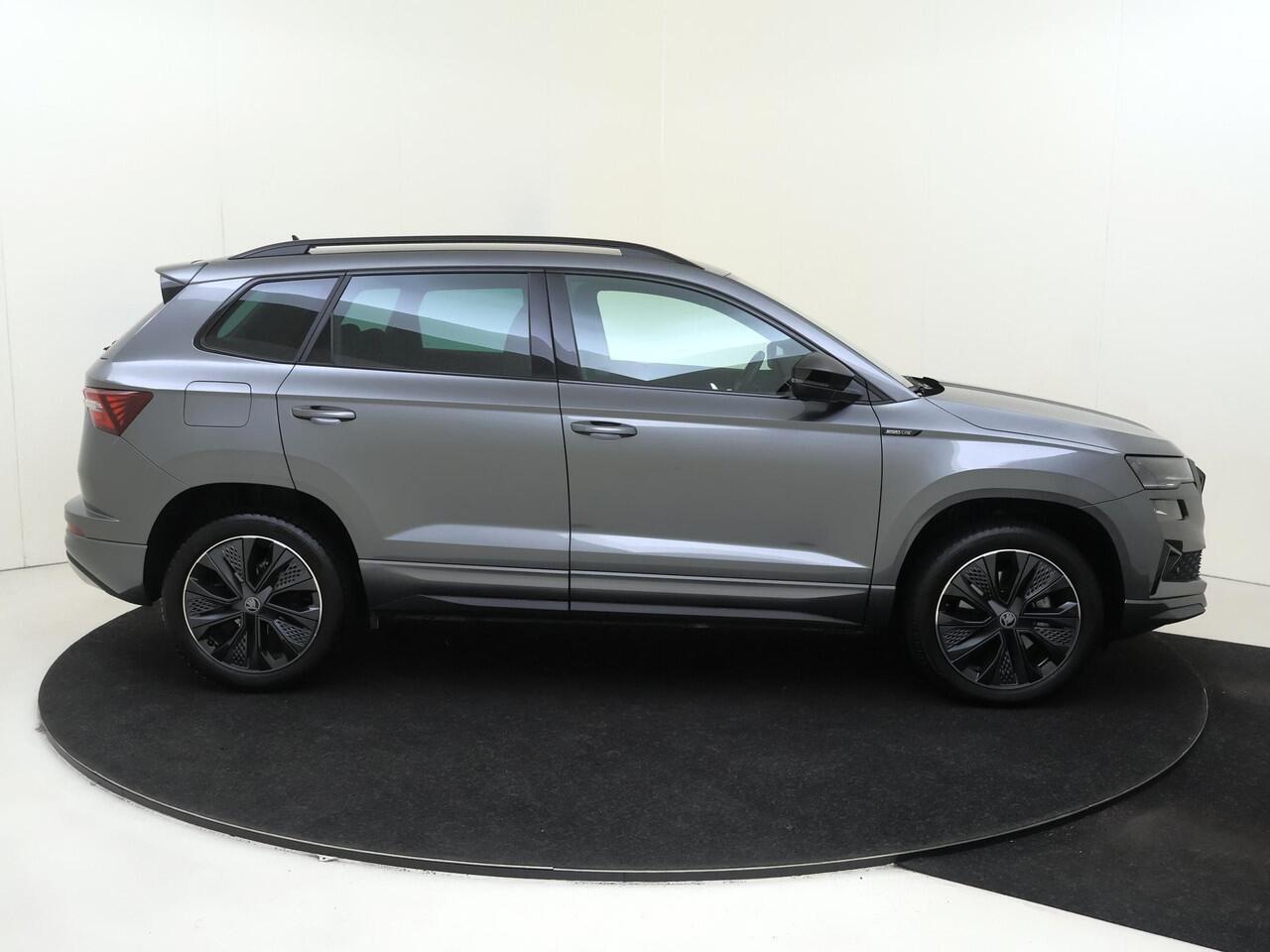 Skoda Karoq 1.5 TSI ACT Sportline Business | Trekhaak | Achteruitrijcamera | Keyless | Adaptieve cruise control | CarPlay | Digital cockpit | Navigatie |