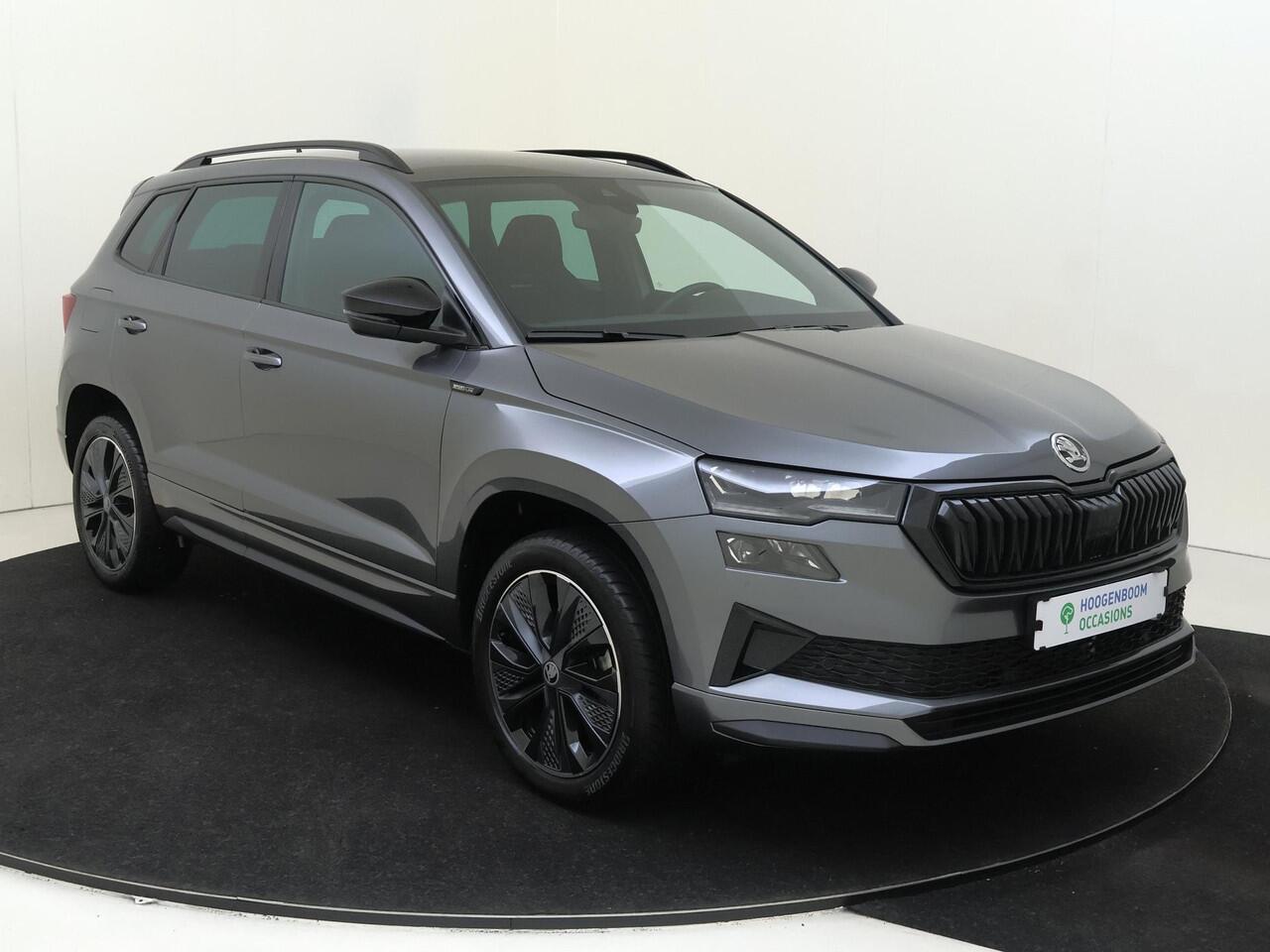 Skoda Karoq 1.5 TSI ACT Sportline Business | Trekhaak | Achteruitrijcamera | Keyless | Adaptieve cruise control | CarPlay | Digital cockpit | Navigatie |