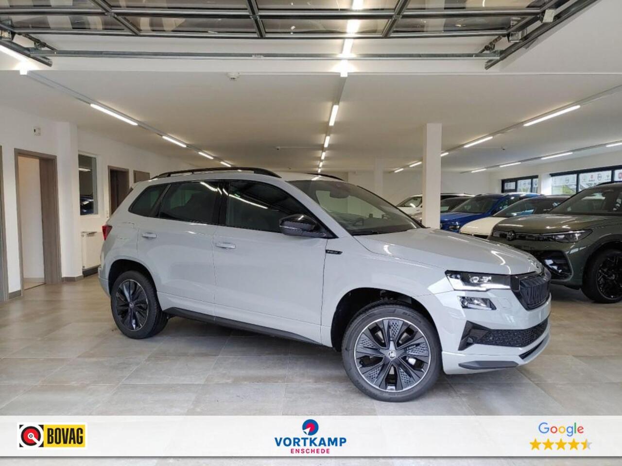 Skoda Karoq 1.5 TSI DSG SPORTLINE TREKHAAK/CAMERA/CARPLAY/ACC/STOELVERW/E-KLEP