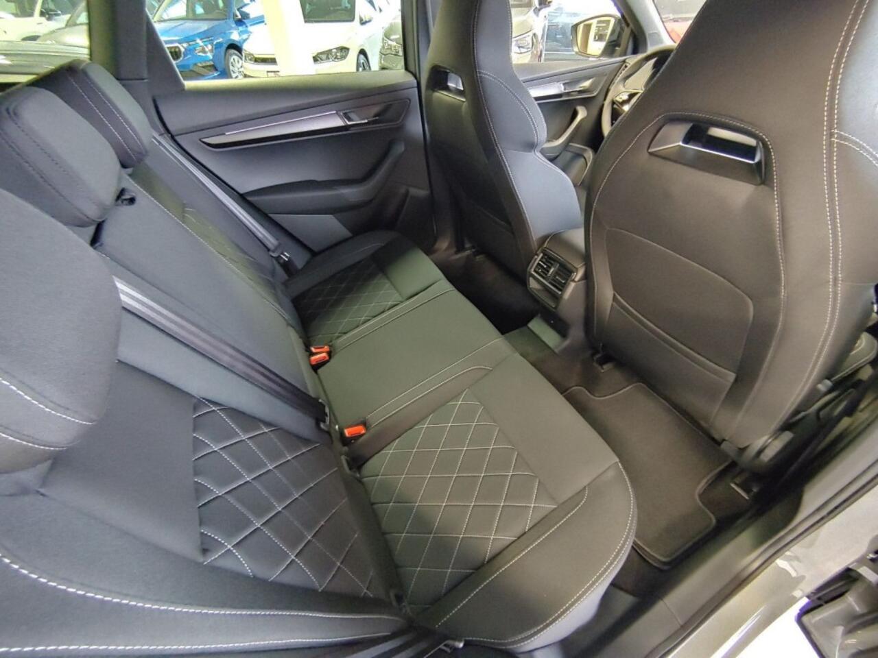 Skoda Karoq 1.5 TSI DSG SPORTLINE TREKHAAK/CAMERA/CARPLAY/ACC/STOELVERW/E-KLEP