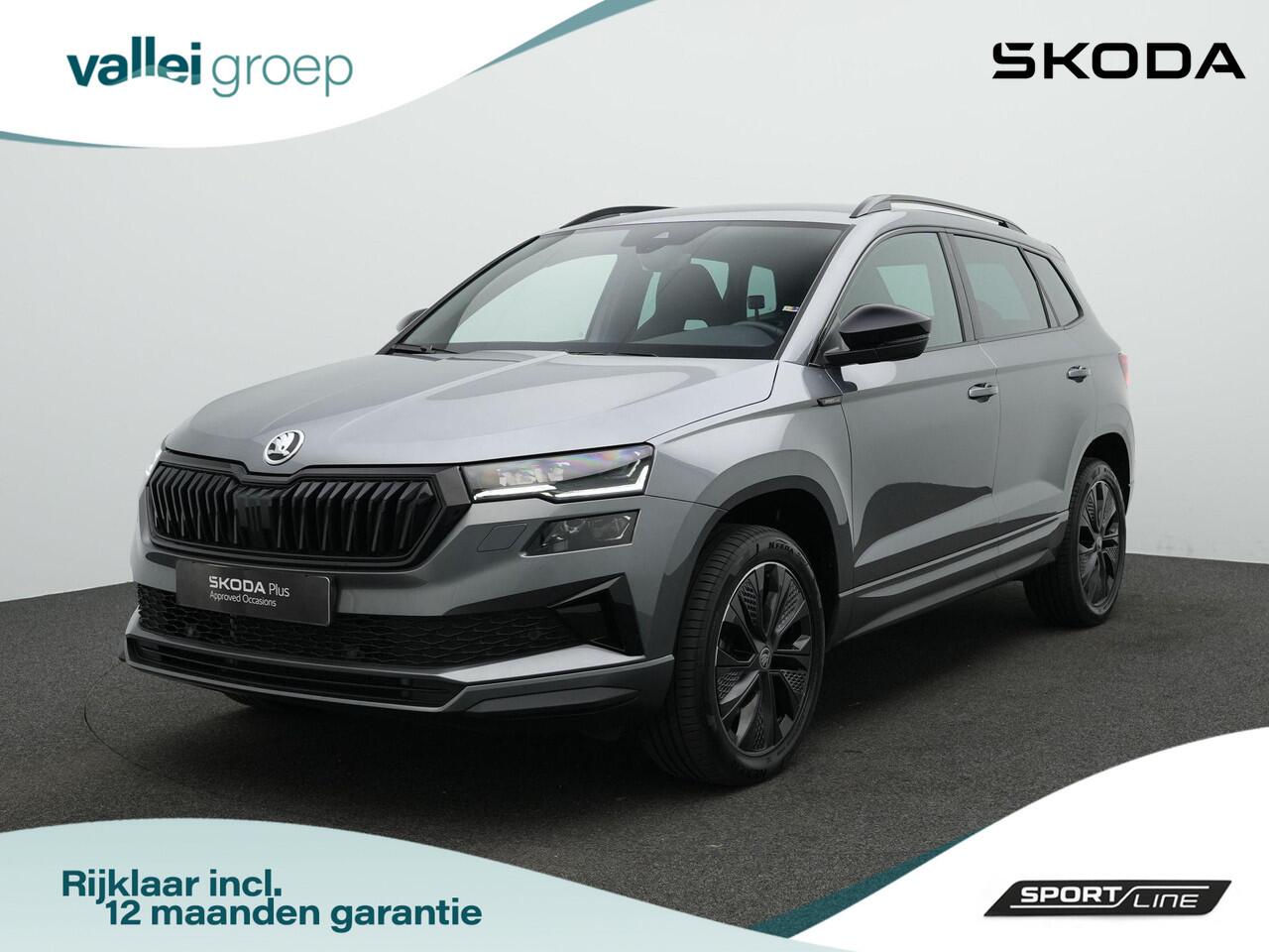 Skoda Karoq 1.5 TSI ACT 150 pk DSG Sportline Business | Canton | Stuur-/stoelverwarming | Achteruitrijcamera | Navigatie | Adaptive Cruise