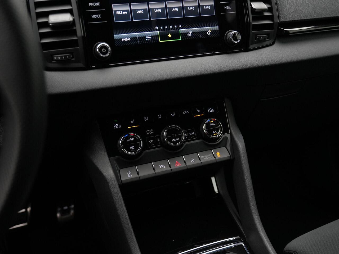 Skoda Karoq 1.5 TSI ACT 150 pk DSG Sportline Business | Canton | Stuur-/stoelverwarming | Achteruitrijcamera | Navigatie | Adaptive Cruise